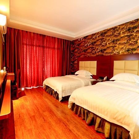 Zhangjiajie City Of Green Theme Hotel Wulingyuan ภายนอก รูปภาพ